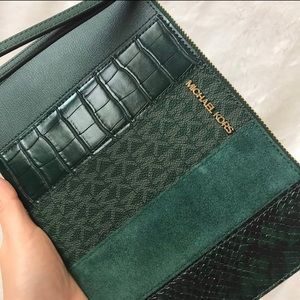 Michael Kors XL patchwork wristlet wallet.